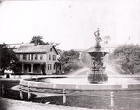 The Barnum Fountain c.1905                                                                                                                                                        In 1881, Bethel’s most famous son, P.T. Barnum, presented his birthplace with a tremendous 18 foot high fountain depicting a triton blowing a conch shell. Barnum had purchased the fountain in Berlin, Germany for $7,000 and had it transported to his Bridgeport mansion, Waldemere. Unfortunately, for Barnum, the fountain required more water than he had anticipated. So it was that on August 19, 1881 Barnum visited Bethel and formally presented the fountain, after spending $3,000 of his own money to have an island of grass created for the fountain and then to have the fountain transported to Bethel from Bridgeport by horse and wagon. The fountain along with its concrete basin that was 30 feet in circumference existed until October 18, 1924 when it was dismantled after falling into disrepair. Four years later the Doughboy statue filled the void caused by the removal of the fountain. 