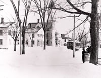 Blizzard on Center Street c.1900                                                                                                                                                  Greenwood Avenue, (then known as Center St,) following a winter storm. The trolley shown, began service on January 1, 1895, and ceased running in November of 1924. The spire of the Methodist Church as well as the Methodist parsonage can be seen on the left side of the street. The building to the left of the parsonage has since been obscured by the storefront currently occupied by H & R Block and The Toy Room.